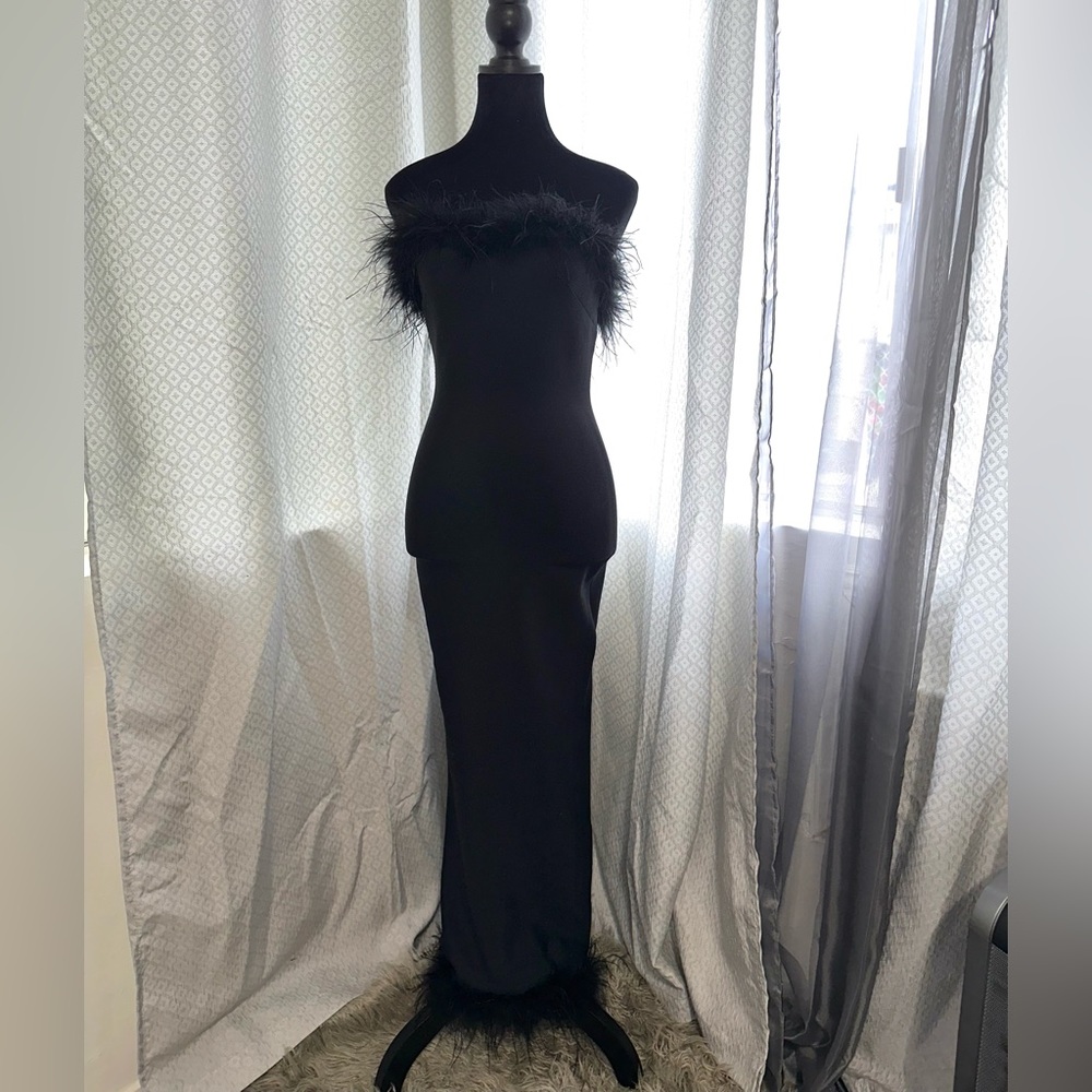 Black strapless feather trim maxi bandage dress.